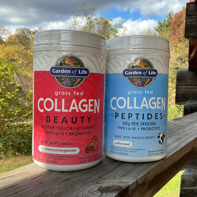 Two Garden of Life collagen products on a wooden surface with a natural background.