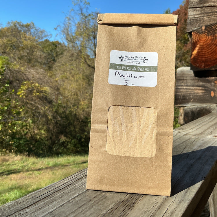 Kraft paper bag with a label on a wooden surface outdoors