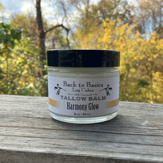 Jar of 'Harmony Glow' balm on a wooden surface with a natural background