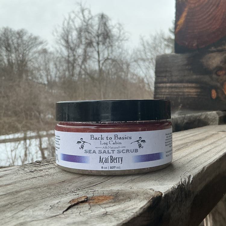 Jar of Acai Berry Sea Salt Scrub on a wooden surface with a natural background