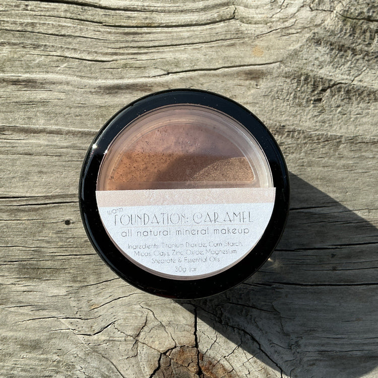 Makeup compact on a wooden surface