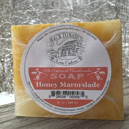 Bar of soap with a label on a textured surface