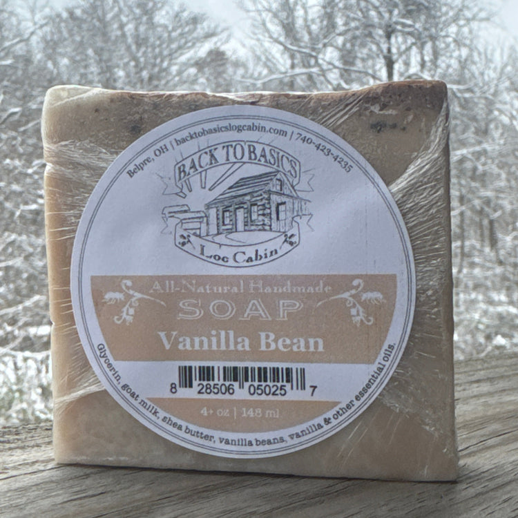 Bar of soap with a label on a textured surface