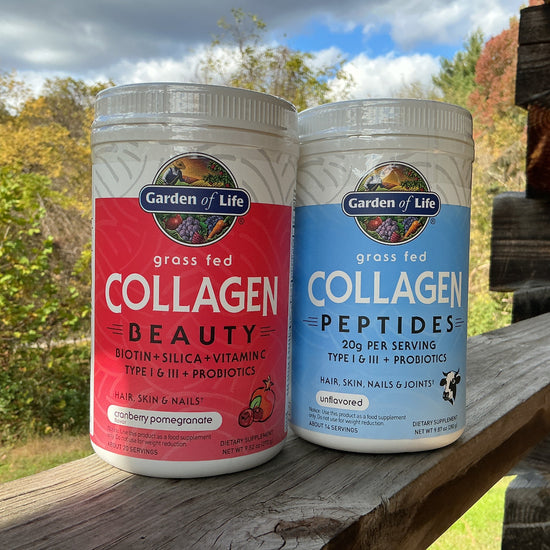 Two Garden of Life collagen products on a wooden surface with a natural background.