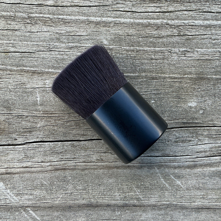 Make up brush on wood surface