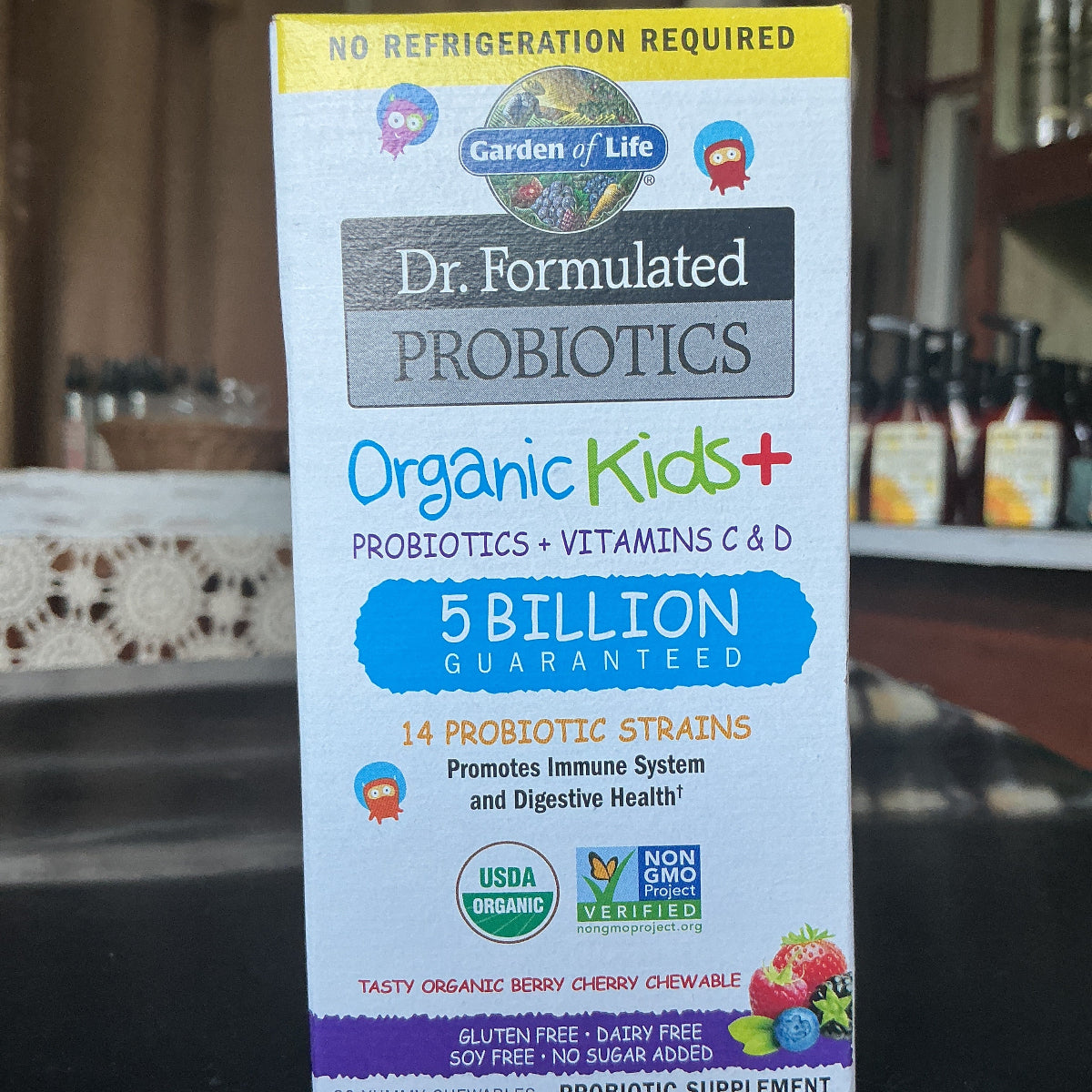 Box of Dr. Formulated Probiotics Organic Kids+ on a dark surface