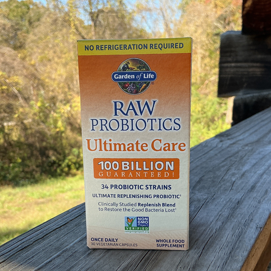 Box of Garden of Life Raw Probiotics Ultimate Care on a wooden surface with a natural background