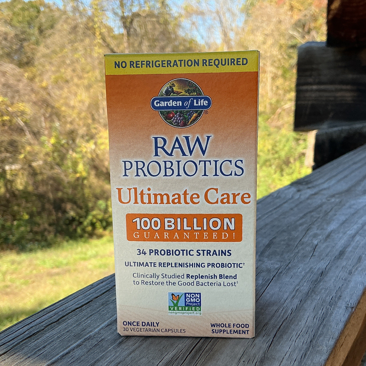 Box of Garden of Life Raw Probiotics Ultimate Care on a wooden surface with a natural background
