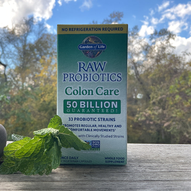 Box of Garden of Life Raw Probiotics Colon Care on a wooden surface with a natural background