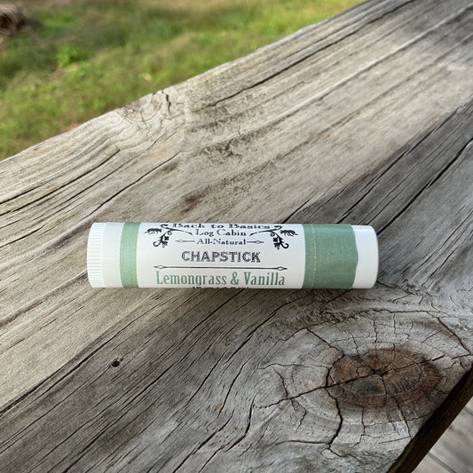Chapstick with a label on a wooden surface