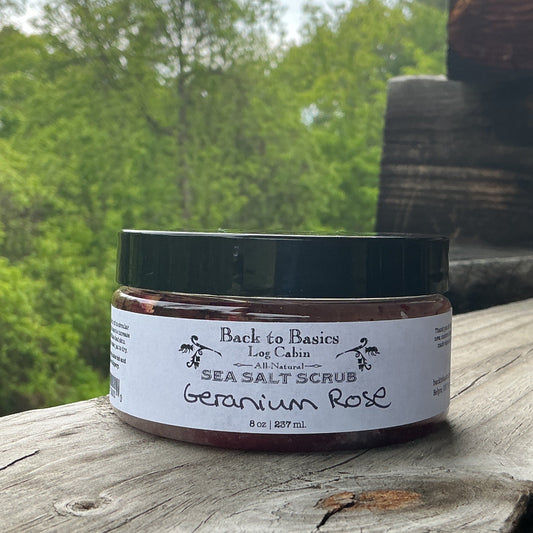 Jar of sea salt scrub on a wooden surface with a natural background