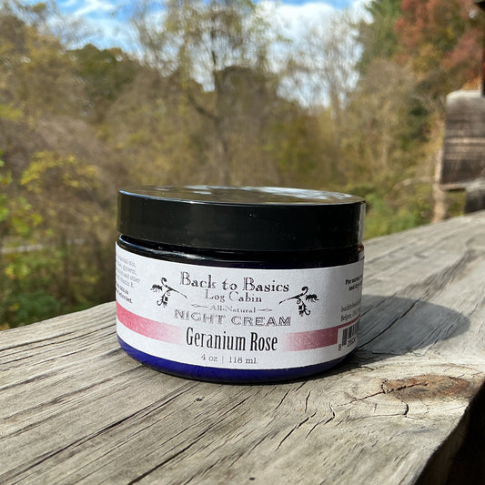 Jar of 'Back to Basics' night cream on a wooden surface with a natural background