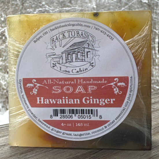 Bar of soap with a label on a reflective surface