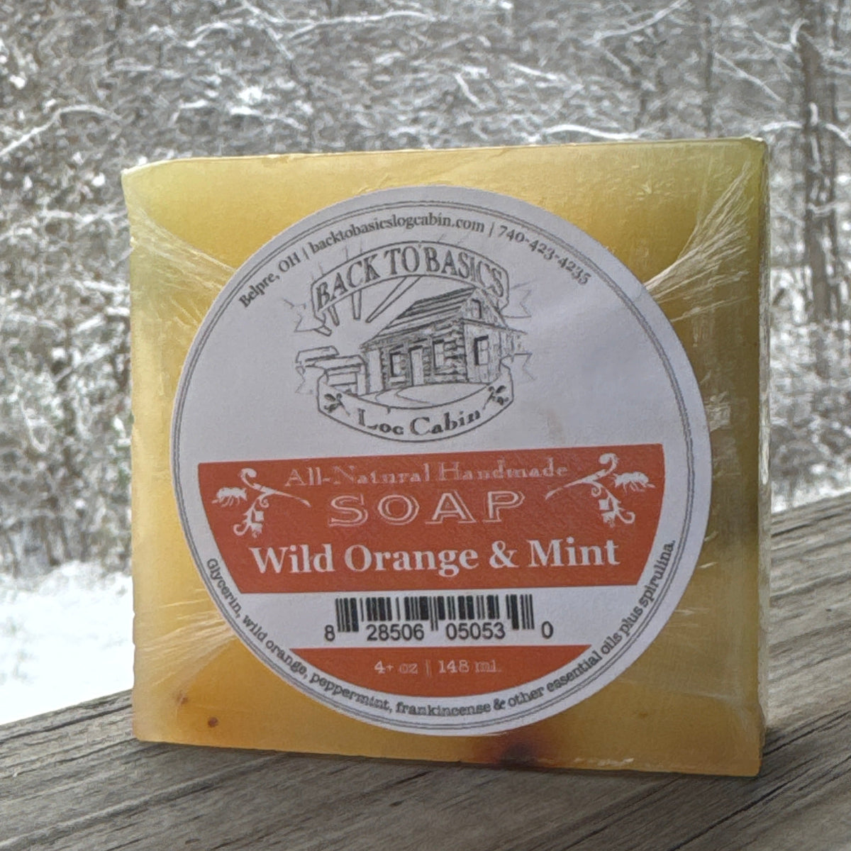 Bar of soap with a label on a textured surface